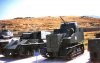 Afg-DissonTractorTank-SU76.jpg