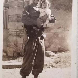 Who is This WWII American Soldier Liberating a Little Girl In France