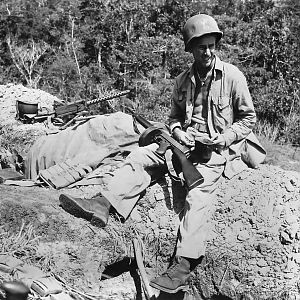 Marine_at_Machine_Gun_Position_on_Edson_s_Ridge_Guadalcanal_1942