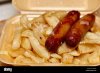 two-sausages-and-chips-a-sausage-supper-from-a-british-takeaway-EEGYK0.jpg